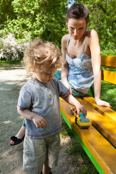 Mum and son together in park — Stock Photo, Image