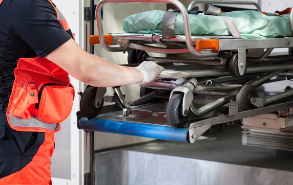 Paramedic with the stretcher — Stock Photo, Image