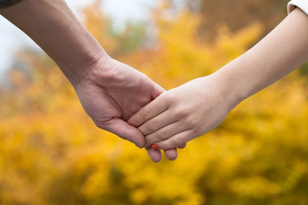 Holding hands — Stock Photo, Image