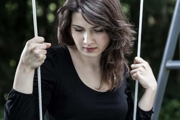 Swinging woman — Stock Photo, Image