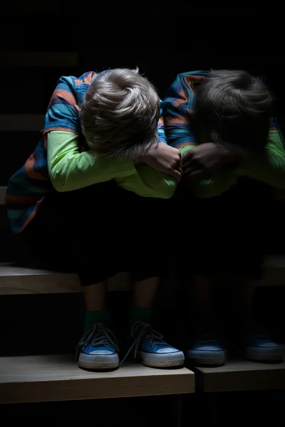 Child sleeping on a stairway — Stock Photo, Image