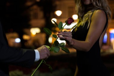 Woman getting rose on first date
