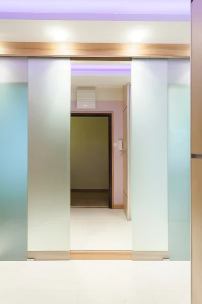 Open illuminated door — Stock Photo, Image