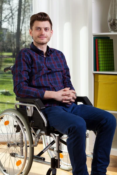 Young man on wheelchair — Stock Photo, Image