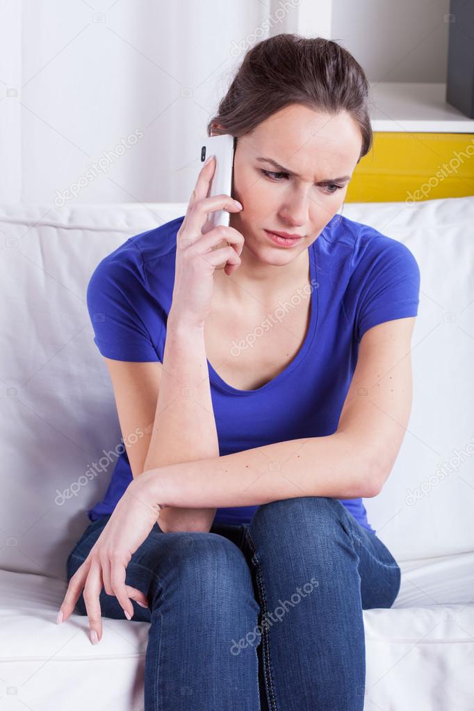 Woman during mobile phone call