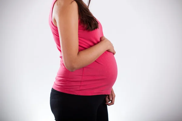 Visão lateral da mulher grávida — Fotografia de Stock