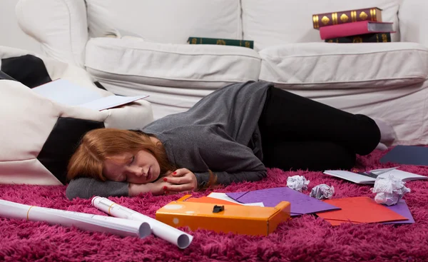 Sleeping among notes on the floor — Stock Photo, Image