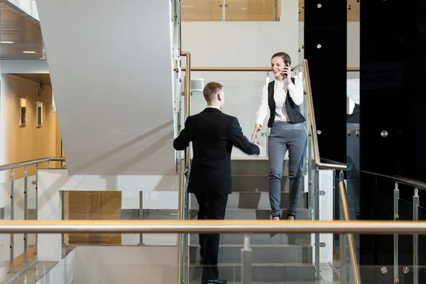 Co-workers shaking hands — Stock Photo, Image