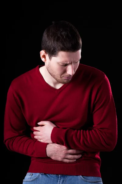 Joven con dolor de estómago — Foto de Stock