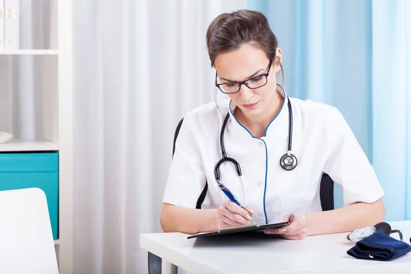 Doctor in her office — Stock Photo, Image