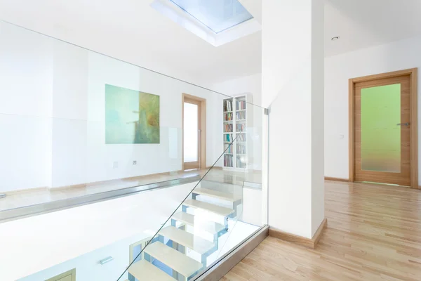 Modern hallway with glass staircase — Stock Photo, Image