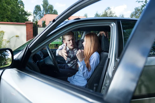 Serious quarrel in a car — Stock Photo, Image