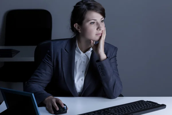 Woman working overtime — Stock Photo, Image