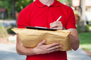 Delivery guy does his paperwork clipart