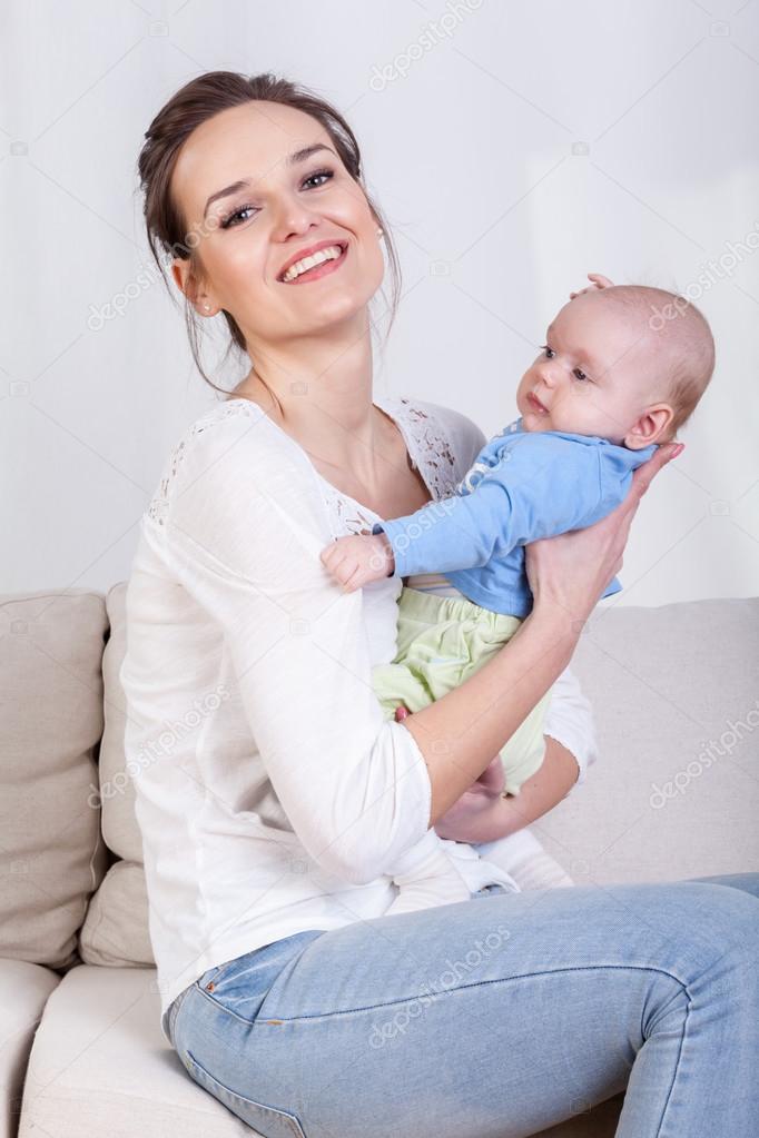 Mum caring baby in her arms