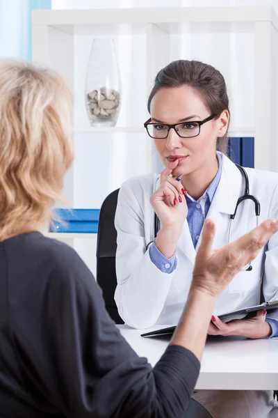 Middle aged woman on medical visit — Stock Photo, Image