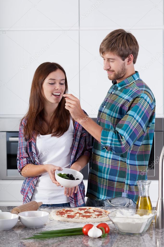 Loving couple made a pizza