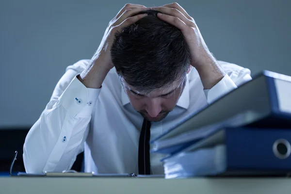 Sad, overworked businessman — Stock Photo, Image