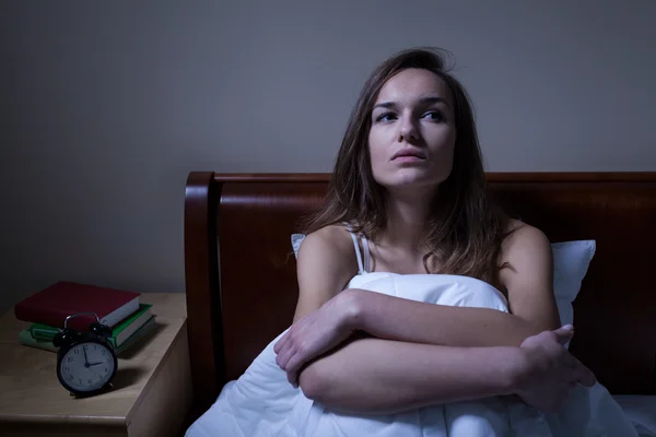 Pensive woman stying sleepless at night — Stock Photo, Image