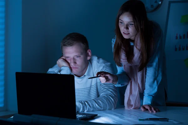 Tired workers working overtime — Stock Photo, Image