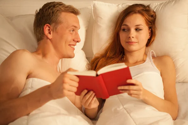 Close-up of couple reading book — Stock Photo, Image