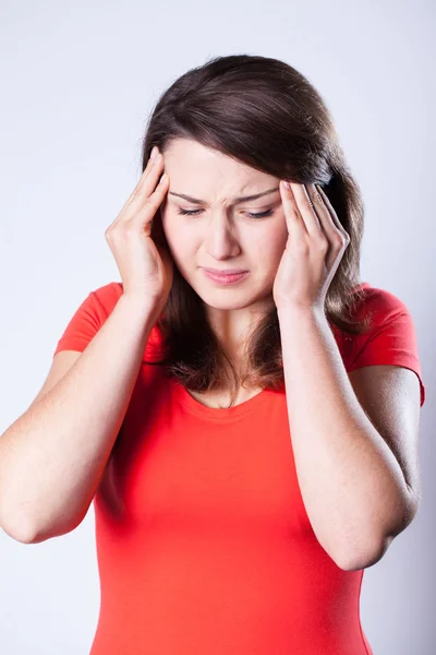 Woman with headache Stock Image