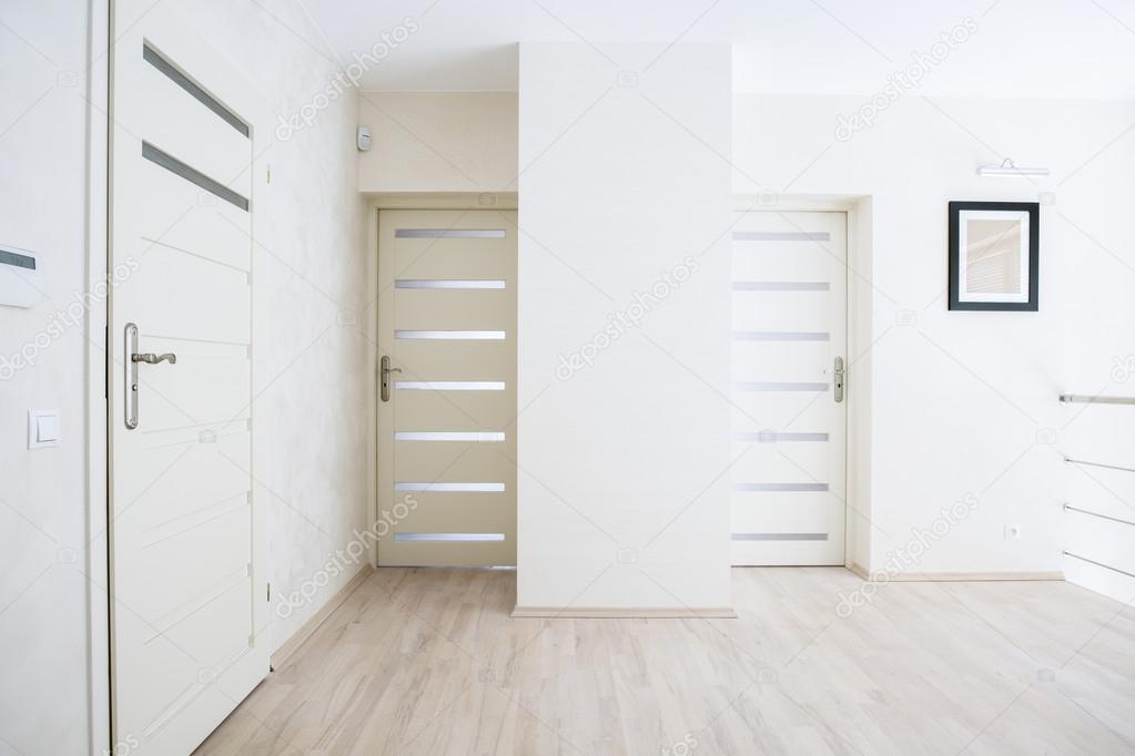 Hall with white doors