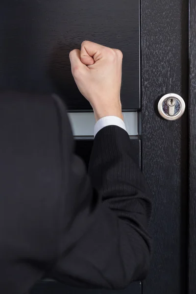 Clenched fist knocking — Stock Photo, Image