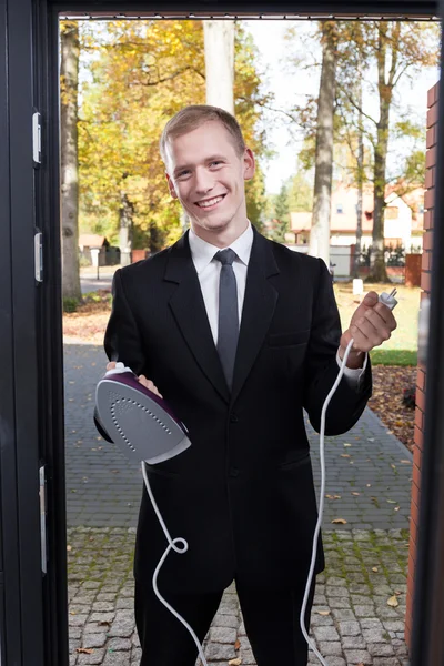 Canvasser trying to sell the iron — Stock Photo, Image