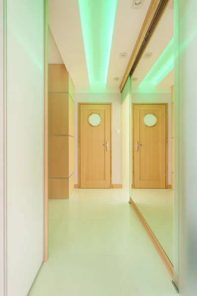 Long hallway with green lightning — Stock Photo, Image