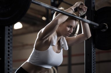 Woman training at crossfit center