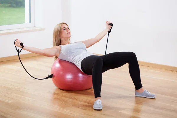 Woman training on fitness ball — Stock Photo, Image