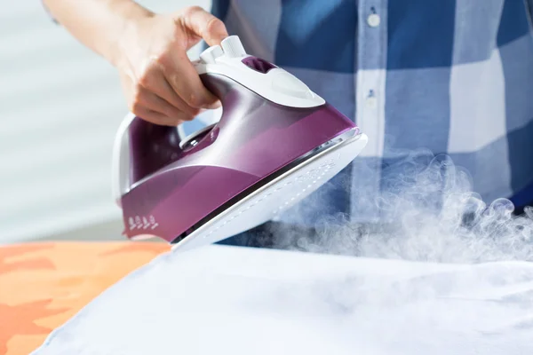 Woman during ironing time — Stock Photo, Image
