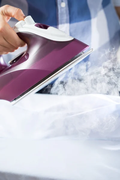 Housewife during ironing time — Stock Photo, Image