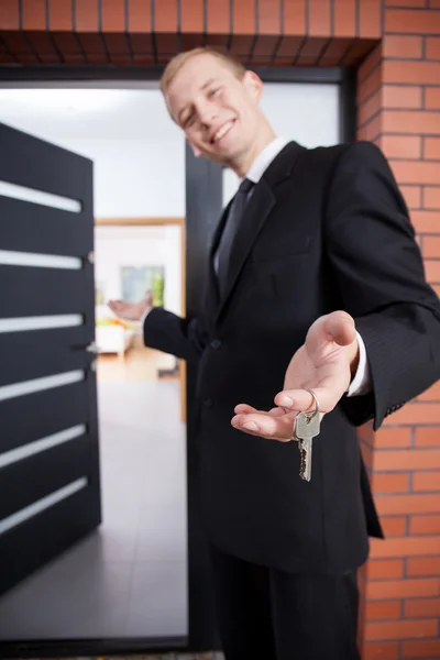 Smiling estate agent — Stock Photo, Image