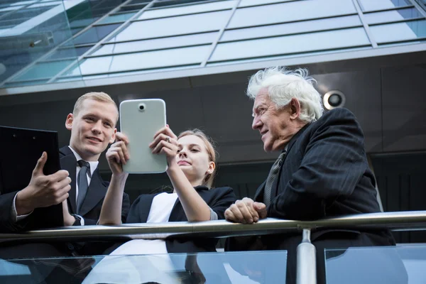 Drie zakenmensen — Stockfoto