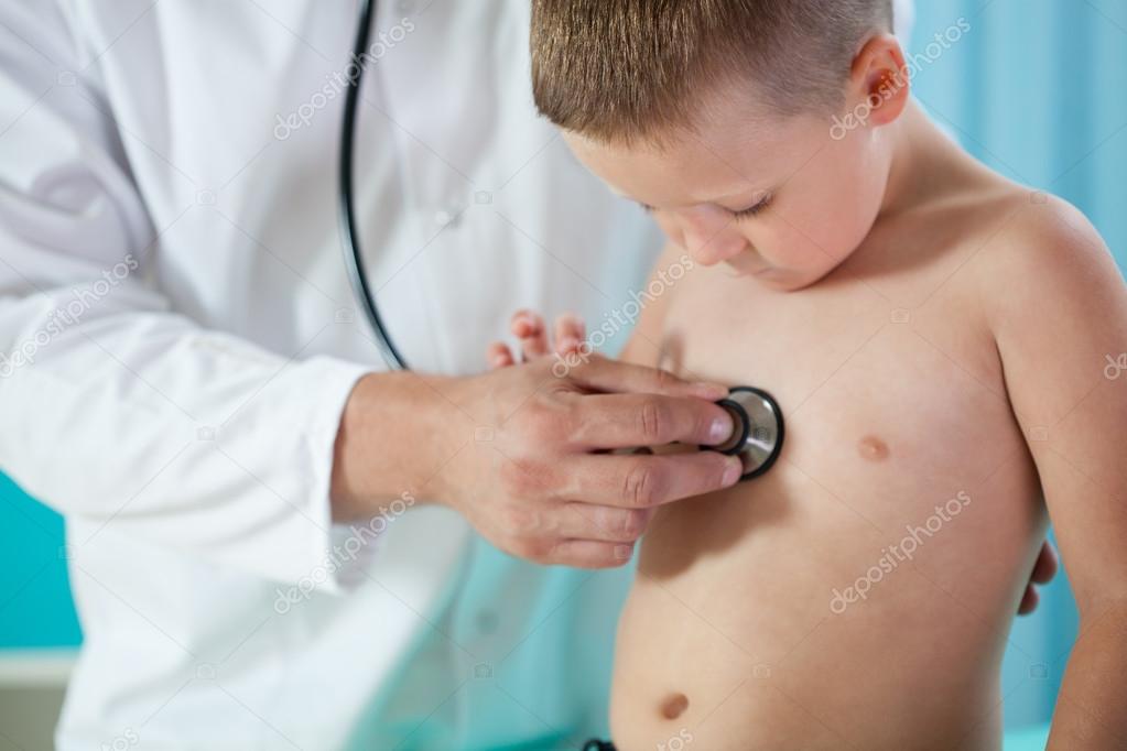 Child chest auscultation Stock Photo by ©photographee.eu 59212061