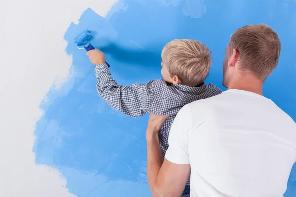 Boy painting wall — Stock Photo, Image