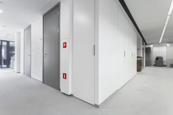 Corridor with grey doors — Stock Photo, Image