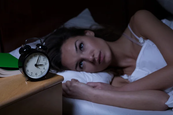 Wanita dengan insomnia Stok Gambar