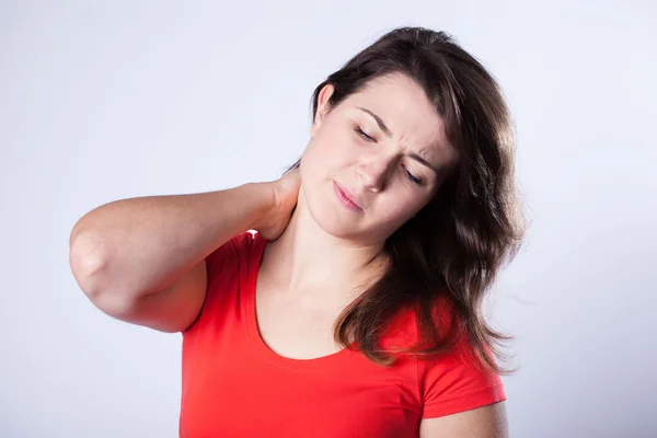 Young woman with stiff neck — Stock Photo, Image