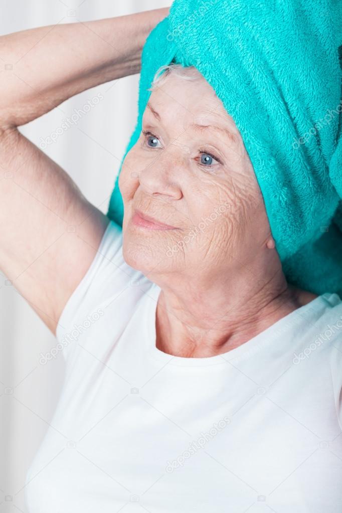 Woman with towel on head 