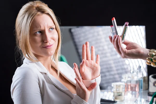 Woman refusing color lipstick — Stock Photo, Image