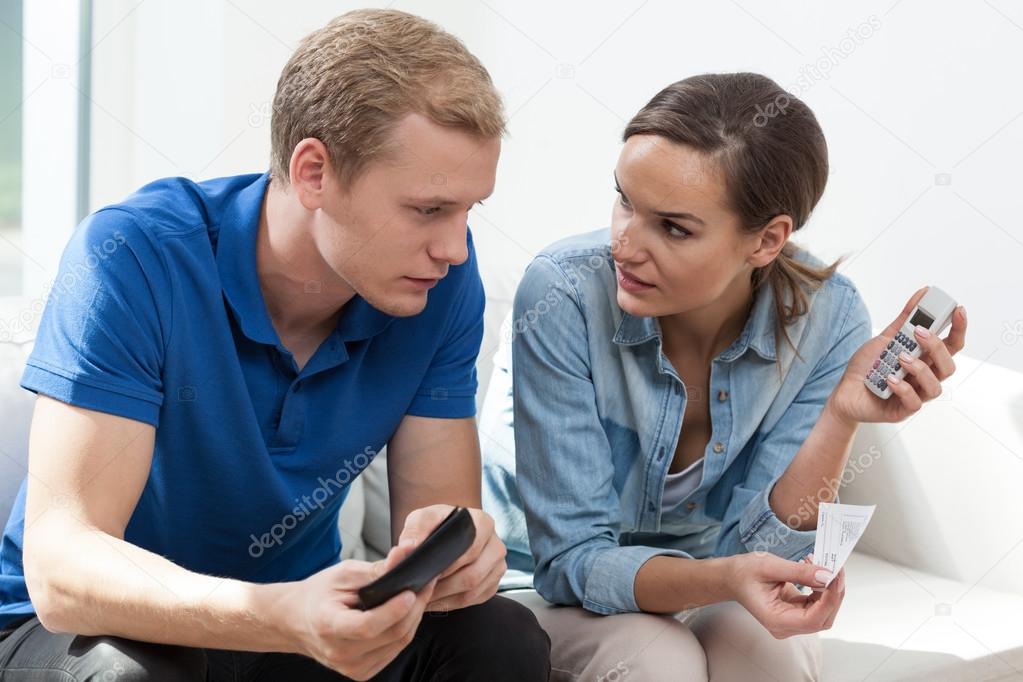 Young couple with financial troubles