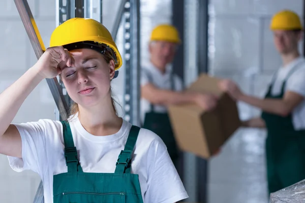 Tired female plant worker — Stock Photo, Image