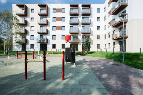 Playground in front of block — Stock Photo, Image