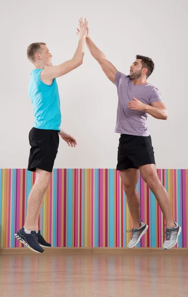 Young men jumping — Stock Photo, Image