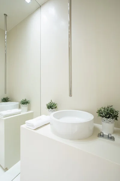 Designed faucet inside white bathroom — Stock Photo, Image