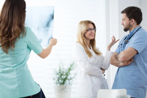 Young doctors working at hospital — Stock Photo, Image