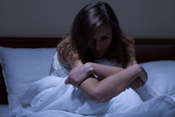 Awake woman suffering from depression